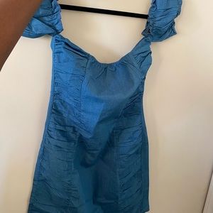 Blue denim dress never has been worn
